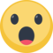 Face With Open Mouth emoji on Facebook